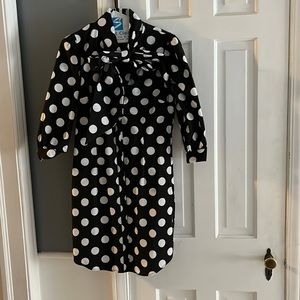 New York and company black polka dot dress with big bow.